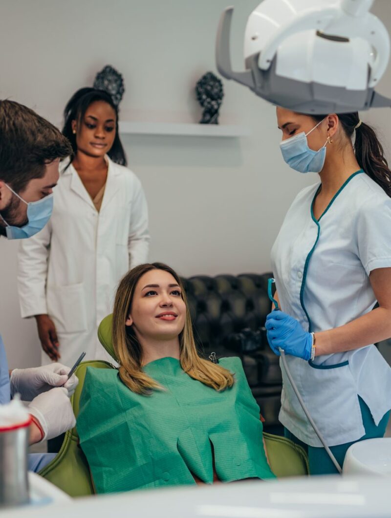 woman-patient-in-dental-clinic-being-examined-by-a-2023-11-27-05-09-59-utc.jpg
